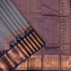 Royal Blue With Silver And Copper Zari Small Diamond Checked With Flower Edge Flower Design And Self Colour With Copper Zari Lotus Butta Lines Bavanji Border Bridal Silk Saree