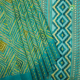 Sea Blue With Lemon Yellow Geometric Square Print And Sea Blue With Multi Colour Thoranam Design Border Fancy Cotton Saree 