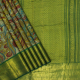 Cream Yellow With Painted Peacock And Flowers With Leaves Design Bottle Green With Gold Zari Mayilkan Mid Peacock And Elephant Butta Border Painting Kalamkari Silk Saree