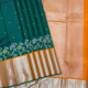 Bottle Green With Small Gold Zari Star Flower Butta Motifs Design And Multi Colour Zari Flowers Padded Fanta Orange With Silver Zari Getti Border Bridal Silk Saree