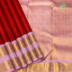 Tomato Red With Gold Zari Small Double Checked Weaving Design And Lavender Pink With Gold Zari Classic Symbols Butta Two Line Border Traditional Silk Saree