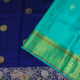Navy Blue Colour With Chakkaram Butta Motifs And Sea Blue Colour Gold Zari Butta Motifs And Multi Colour Thread Embroidered Double Border Pure Tussar Silk Saree