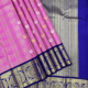 Baby Pink With Silver Gold Zari Lines Grouped Checks And Peacock Butta Motifs Design And Indigo Blue With Gold Zari Self Designed Cercles Butta Border Exclusive Bridal Silk Saree