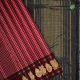 Maroon Red With White Silk Thread Work Checked Window Panel And Maroon Brown With Gold Zari Peacock With Thilagam Butta Border Traditional Silk Saree