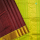 Maroon Brown With Full Body Plain Weaved And Manthulir Green With Gold Zari Peacock And Mango Design Butta Border Pure Silk Cotton Saree