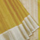 Honey Orange Gold And Silver Zari Full Body Self Checked Design And Milk White With Gold Zari Rangoli Floral And Checks Design Border Fancy Tissue Buti Saree