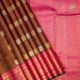Maroon Red With Gold Zari Velthari And Vairaoosi Checked Checked Window Panel With Silver And Gold Zari Peacock  Butta Motifs Rose Pink With Peacock Butta Border Traditional Silk Saree