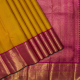 Mango Yellow With Pink Silk Thread Small Checked Window Panel Design And Rose Pink With Gold Zari Peacock Rangoli Butta Lines And Zig Zag Lines Border Traditional Silk Saree