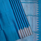 Peacock Blue Full Body Plain Weaved Design And Self Colour With Silver Copper Zari Triangle Tower Shape Border Soft Silk Saree