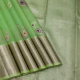 Pista Green With Silver Zari With Multi Colour Silk Thread Flower With Leaves Butta Design And Self Colour With Rose Gold Zari Cross Line Bavanji Border Kora Silk Saree 