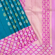 Peacock Blue With Silver And Gold Zari Mango And Thilagam Butta Motifs Design And Lavender Pink With Silver Gold Zari Leaf Design Coved by Silk Thread Design Border Contemporary Silk Saree 