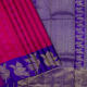 Magenta Pink With Red And Rose Pink Silk Thread Rangoli Floral Full Body Weaved Design And Purple Blue With Gold Zari Flying Peacock Butta Design Border bridal Silk Saree