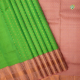 Parrot Green With Gold And Copper Zari Small Flower Butta Motifs And Onion Pink With Copper Zari Two Line Flower With Pot Gap Border Traditional Silk Saree 