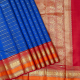 Royal Blue With Gold Zari Multi Designed Lines Design And Contrast Rani Red With Gold Zari Peacock Butta And Orange Gap Border Traditional Silk Saree 