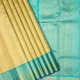 Beige With Gold Zari Mango Thilagam Small Leaf Butta Motifs Sea Blue With Gold Zari Floral Design And Mayikan Border Traditional Silk Saree