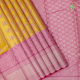 Corn Yellow With Silver Zari Multi Shape Multi Design Silk Thread Associated Design Weaved And Pale Pink With Silver Zari Multi Shape Floral Mayilkan High Border Bridal Silk Saree