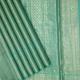 Rexona Green With Gold Zari Self Multi Design Butta Motifs And Self Colour With Gold Zari Lines And Stripes Border Grand Tissue Bridal Silk Saree