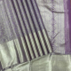 Lavender With Neem Zari Small Grand Floral Creeper Design And Self Colour Silver Zari Multi Divided Design Border Grand Bridal Tissue Silk Saree